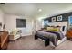 Serene main bedroom featuring neutral tones, contemporary decor, and ample natural light at 37061 Sagemoor Dr, Zephyrhills, FL 33541