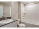 A clean bathroom featuring neutral tones, a tub-shower combo, and modern fixtures at 37171 Sagemoor Dr, Zephyrhills, FL 33541