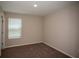 Bedroom featuring carpet and a bright window at 37222 Sagemoor Dr, Zephyrhills, FL 33541