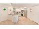 Well-lit kitchen with stainless steel appliances, white cabinetry, and modern sink fixtures at 4212 Mill Valley Ct, Tampa, FL 33618