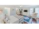 Relaxing main bedroom features wood floors, neutral decor, and an en-suite bathroom at 4212 Mill Valley Ct, Tampa, FL 33618
