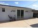 The covered back patio is perfect for entertaining with sliding glass doors at 4529 W Knox St, Tampa, FL 33614