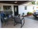 Relaxing covered patio with chairs and decorative plants at 4529 W Knox St, Tampa, FL 33614