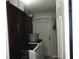 The laundry room includes washer, dryer, and storage cabinets at 4529 W Knox St, Tampa, FL 33614