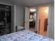 View from main bedroom to dining room; shows closet and ensuite bathroom doors at 4529 W Knox St, Tampa, FL 33614