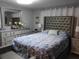 This main bedroom is a relaxing retreat with a plush bed and dresser at 4529 W Knox St, Tampa, FL 33614