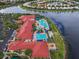 Luxurious community clubhouse offers resort-style amenities including a pool, and is conveniently located near a serene lake at 4917 Sandy Brook Crk, Wimauma, FL 33598
