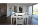 Dining room featuring a staircase to the second floor, and sliding door access to the patio at 5348 Saddlebrook Way # 2, Wesley Chapel, FL 33543