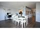Open floorplan featuring the dining and work area connected to the kitchen at 5348 Saddlebrook Way # 2, Wesley Chapel, FL 33543