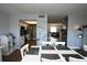 Open concept floorplan showing dining area, kitchen, and living room at 5348 Saddlebrook Way # 2, Wesley Chapel, FL 33543