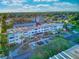 Charming condominium complex featuring well-maintained grounds and convenient parking at 55 Harbor View Ln # 108, Belleair Bluffs, FL 33770