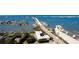 Breathtaking aerial view showcasing waterfront access, nearby bridge and city views at 55 Harbor View Ln # 108, Belleair Bluffs, FL 33770