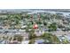 Aerial view showcases a charming neighborhood and this home's prime location near the water and local golf course at 6630 Gulfport S Blvd, South Pasadena, FL 33707