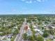 Beautiful aerial view showcases a charming neighborhood, lush greenery, and this home's central location at 6630 Gulfport S Blvd, South Pasadena, FL 33707
