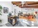 Open-concept living room with a bar area, comfortable seating, and stylish decor for modern living at 6630 Gulfport S Blvd, South Pasadena, FL 33707
