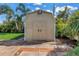 Detached storage shed with double doors is a bonus feature of this property at 6630 Gulfport S Blvd, South Pasadena, FL 33707