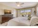 View of the pool from the main bedroom with dark dresser and patio doors at 781 Binnacle Point Dr, Longboat Key, FL 34228