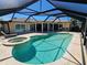 Private pool and spa area with ample seating, offering a serene outdoor living space at 781 Binnacle Point Dr, Longboat Key, FL 34228