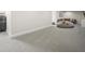 Open basement area featuring plush carpeting, offering versatility for various activities at 876 Ranch Rd, Tarpon Springs, FL 34688