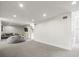 Spacious finished basement offers ample space for entertaining and relaxation at 876 Ranch Rd, Tarpon Springs, FL 34688