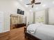 Main bedroom showcasing a seating area and an ensuite bathroom at 876 Ranch Rd, Tarpon Springs, FL 34688