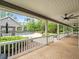Extensive outdoor patio area with a view of the pool and landscaped backyard at 876 Ranch Rd, Tarpon Springs, FL 34688