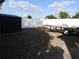 A backyard features a shed, trailer, and privacy fence at 8822 Rocky Creek Dr, Tampa, FL 33615