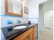 This bathroom offers a sink and vanity with modern fixtures at 9948 51St N Ave, St Petersburg, FL 33708