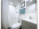 Compact bathroom featuring a new shower and fixtures, offering functionality and modern style at 9948 51St N Ave, St Petersburg, FL 33708