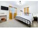 Cozy bedroom featuring a comfortable bed, stylish decor, and lots of natural light at 9948 51St N Ave, St Petersburg, FL 33708