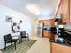 Modern kitchen featuring stainless steel appliances, granite countertops, and stylish decor, perfect for cooking at 9948 51St N Ave, St Petersburg, FL 33708