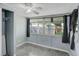 Bedroom featuring a window with curtains, and closet space at 10275 117Th Dr, Largo, FL 33773