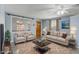 Bright and airy living room, virtually staged, showcasing a comfortable seating arrangement at 10275 117Th Dr, Largo, FL 33773