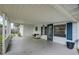 Covered patio area that offers an inviting outdoor living space with access to the backyard at 10275 117Th Dr, Largo, FL 33773