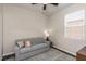 Cozy bedroom with a love seat and neutral colors at 11142 Spring Point Cir, Riverview, FL 33579