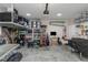Organized garage featuring overhead and wall storage, maximizing space and utility at 11142 Spring Point Cir, Riverview, FL 33579