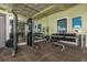 Well-equipped community fitness center with weight machines and a variety of dumbbells at 11142 Spring Point Cir, Riverview, FL 33579