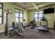 Community fitness room featuring a treadmill, rowing machine, and weight training equipment at 11142 Spring Point Cir, Riverview, FL 33579