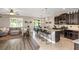 Bright, open concept living space combines kitchen, dining and living rooms with great natural light at 11142 Spring Point Cir, Riverview, FL 33579