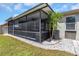 Home exterior showing a comfortable screened-in patio at 11142 Spring Point Cir, Riverview, FL 33579