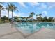 Inviting community pool with clear blue water and comfortable lounging areas for residents' enjoyment at 11142 Spring Point Cir, Riverview, FL 33579