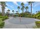 Fun splash pad area with colorful water features and shaded seating, ideal for Gathering fun at 11142 Spring Point Cir, Riverview, FL 33579