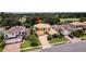 Lovely two-story home nestled in a serene neighborhood surrounded by lush greenery and a tranquil pond at 12610 Eagles Entry Dr, Odessa, FL 33556