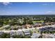 Charming two-story home surrounded by lush trees in a beautiful neighborhood near a tranquil pond at 12610 Eagles Entry Dr, Odessa, FL 33556