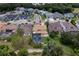 Beautiful two-story home featuring a screened pool and a lush backyard, with a golf course nearby at 12610 Eagles Entry Dr, Odessa, FL 33556