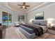 Relaxing main bedroom with a king bed and private access to the outdoor pool area at 12610 Eagles Entry Dr, Odessa, FL 33556