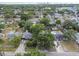 An expansive aerial view shows the home and its surrounding neighborhood at 130 41St Ne Ave, St Petersburg, FL 33703