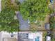 A captivating aerial view showing the home, pool, and lush greenery at 130 41St Ne Ave, St Petersburg, FL 33703
