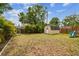 Large backyard with storage shed and play set at 130 41St Ne Ave, St Petersburg, FL 33703