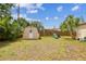 Large backyard with storage shed and playset for children at 130 41St Ne Ave, St Petersburg, FL 33703